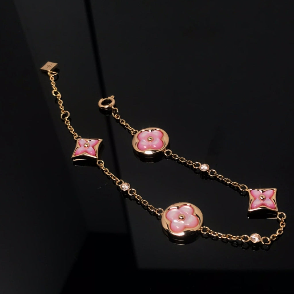 [sparkle Jewelry ]STAR AND SUN 4 MOTIF PINK MOP PINK GOLD BRACELET
