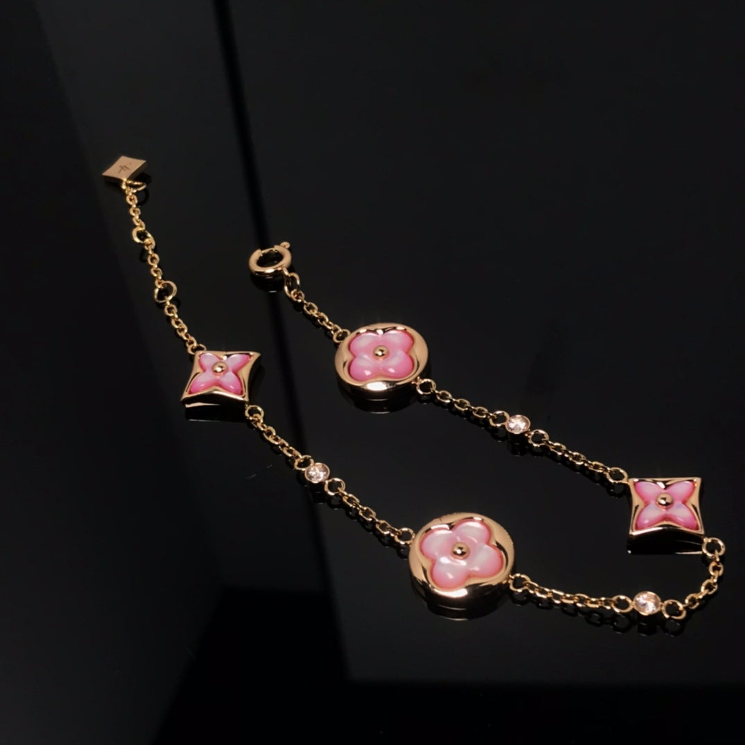 [sparkle Jewelry ]STAR AND SUN 4 MOTIF PINK MOP PINK GOLD BRACELET