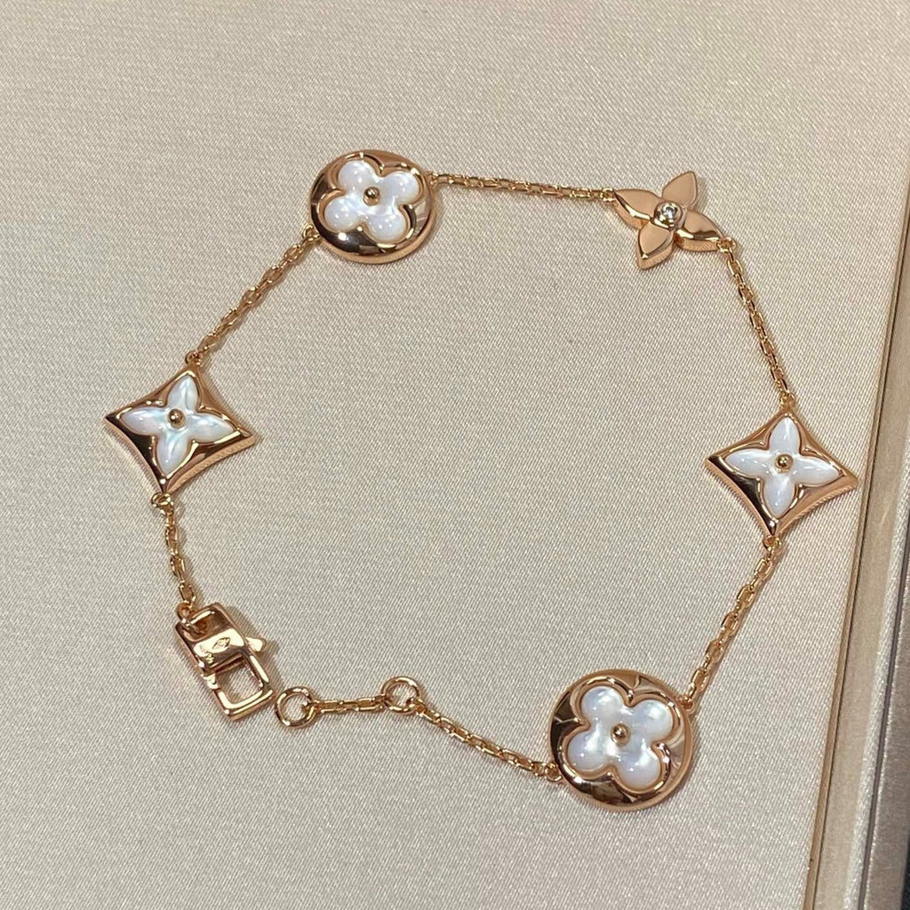[sparkle Jewelry ]STAR AND SUN 5 MOTIF MOP PINK GOLD BRACELET