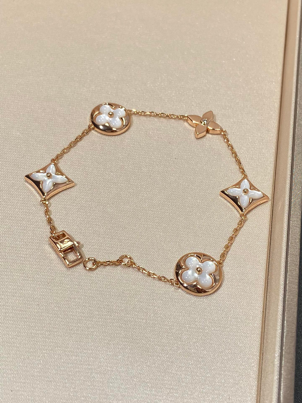 [sparkle Jewelry ]STAR AND SUN 5 MOTIF MOP PINK GOLD BRACELET