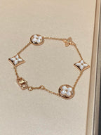 [sparkle Jewelry ]STAR AND SUN 5 MOTIF MOP PINK GOLD BRACELET