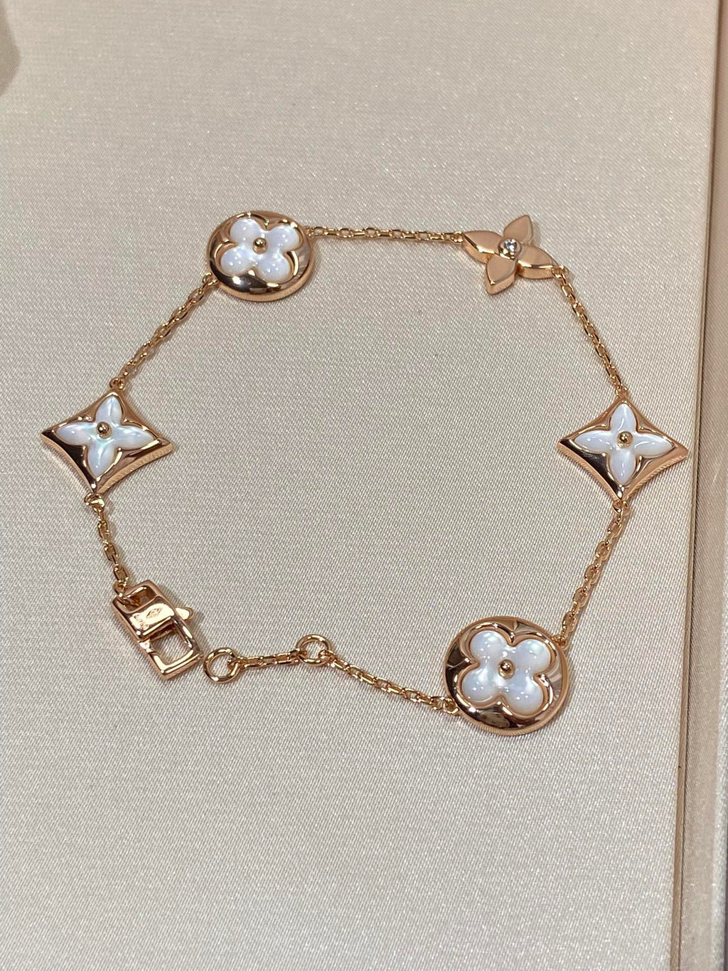 [sparkle Jewelry ]STAR AND SUN 5 MOTIF MOP PINK GOLD BRACELET
