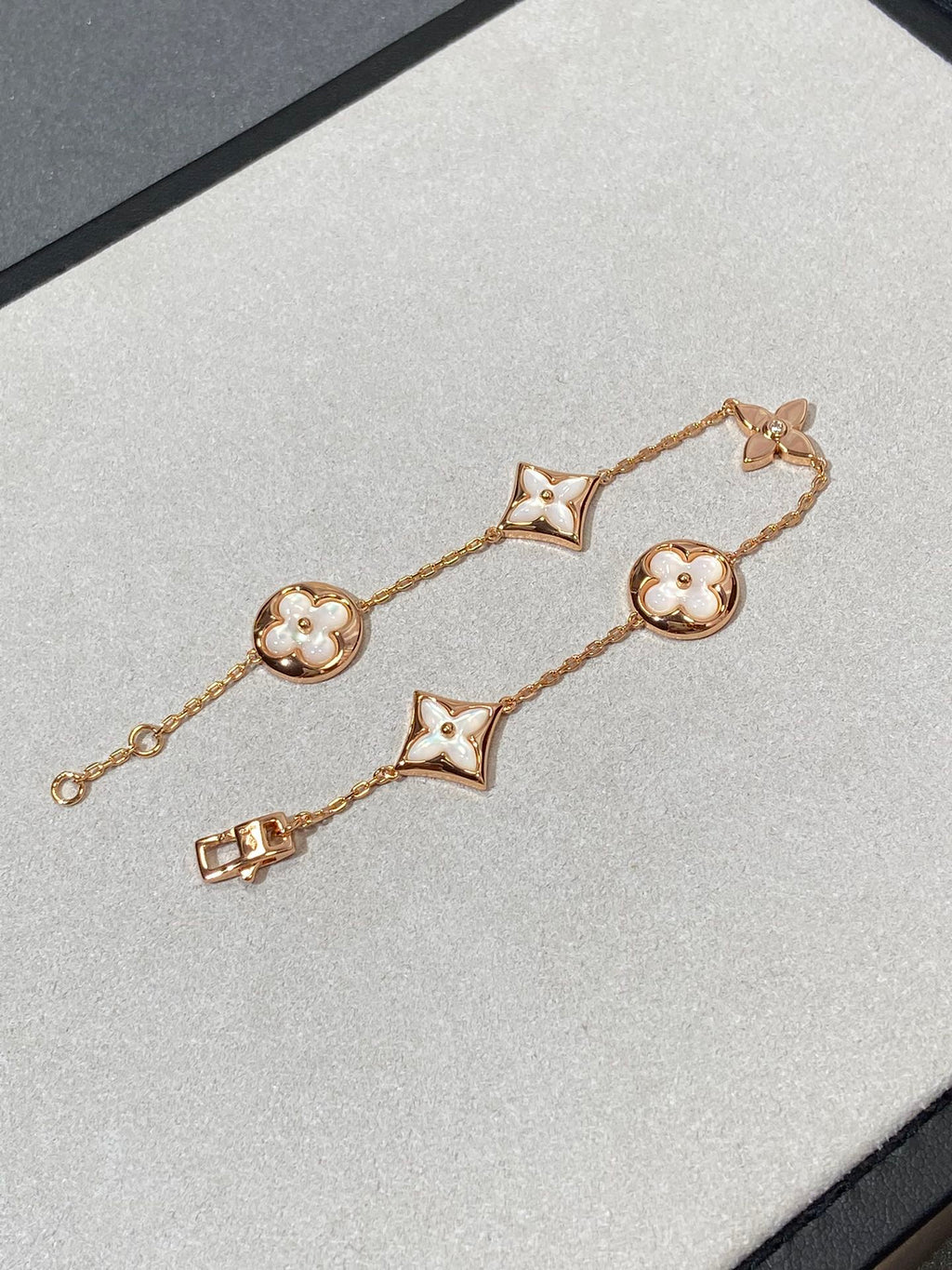 [sparkle Jewelry ]STAR AND SUN 5 MOTIF MOP PINK GOLD BRACELET