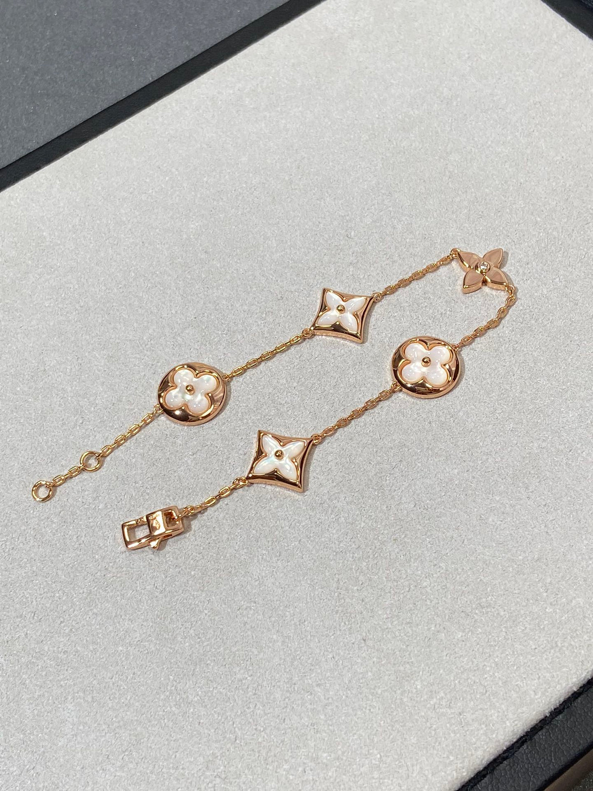 [sparkle Jewelry ]STAR AND SUN 5 MOTIF MOP PINK GOLD BRACELET