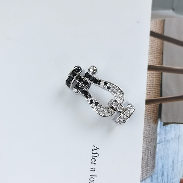 [Sparkle]GROSSES HUFEISEN-ARMBAND MIT SCHWARZEN UND WEISSEN DIAMANTEN - WEISSGOLD