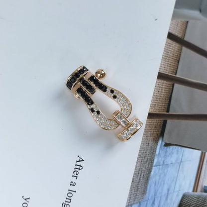 [Sparkle]GROSSES HUFEISEN-ARMBAND MIT SCHWARZEN UND WEISSEN DIAMANTEN - WEISSGOLD