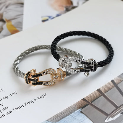 [Sparkle]GROSSES HUFEISEN-ARMBAND MIT SCHWARZEN UND WEISSEN DIAMANTEN - WEISSGOLD
