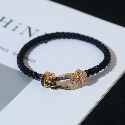 [Sparkle]GROSSES HUFEISEN-ARMBAND MIT SCHWARZEN UND WEISSEN DIAMANTEN - WEISSGOLD