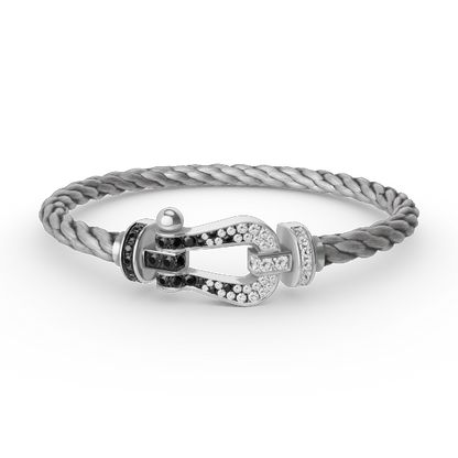 [Sparkle]GROSSES HUFEISEN-ARMBAND MIT SCHWARZEN UND WEISSEN DIAMANTEN - WEISSGOLD