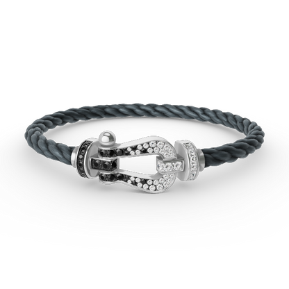 [Sparkle]GROSSES HUFEISEN-ARMBAND MIT SCHWARZEN UND WEISSEN DIAMANTEN - WEISSGOLD