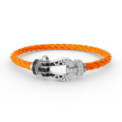 [Sparkle]GROSSES HUFEISEN-ARMBAND MIT SCHWARZEN UND WEISSEN DIAMANTEN - WEISSGOLD