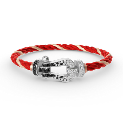 [Sparkle]GROSSES HUFEISEN-ARMBAND MIT SCHWARZEN UND WEISSEN DIAMANTEN - WEISSGOLD